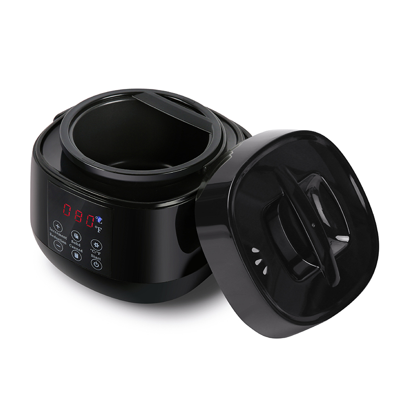 Liten vaxsmältdegel med svart handtag